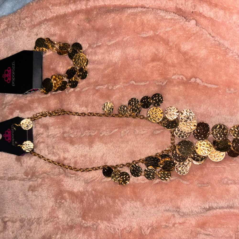 Gold necklace, earrings and bracelet